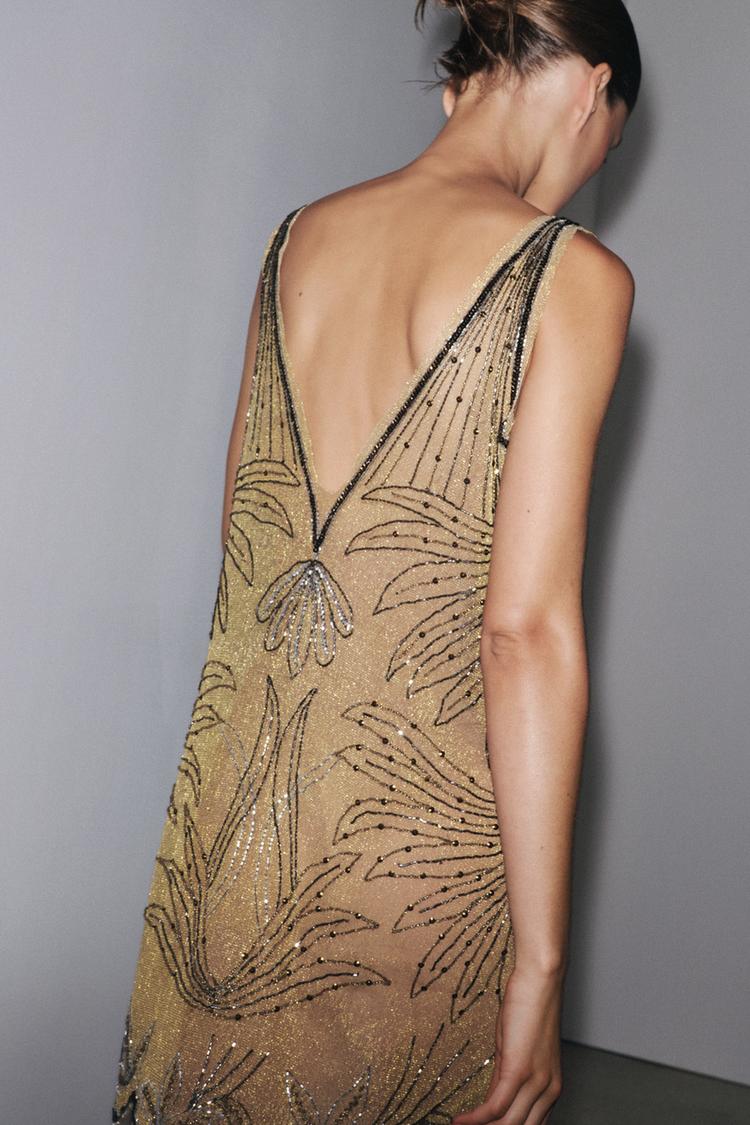 ÁNGELA - VESTIDO MINI CON ESCOTE EN V